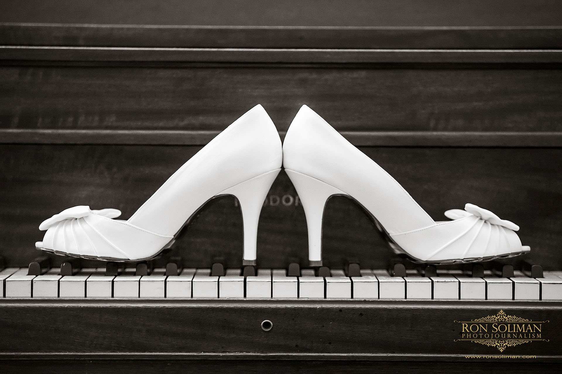 wedding shoes on a piano