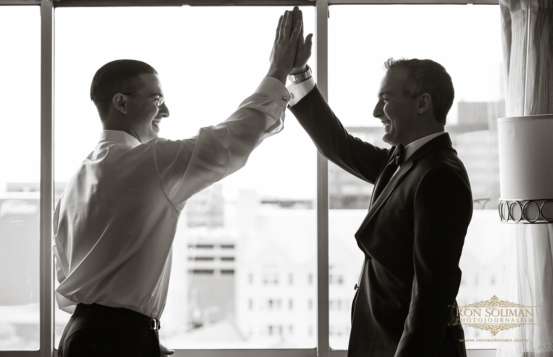 Groom and Best Man High Five Photo | Rainbow Room New York Wedding Noel + Rob