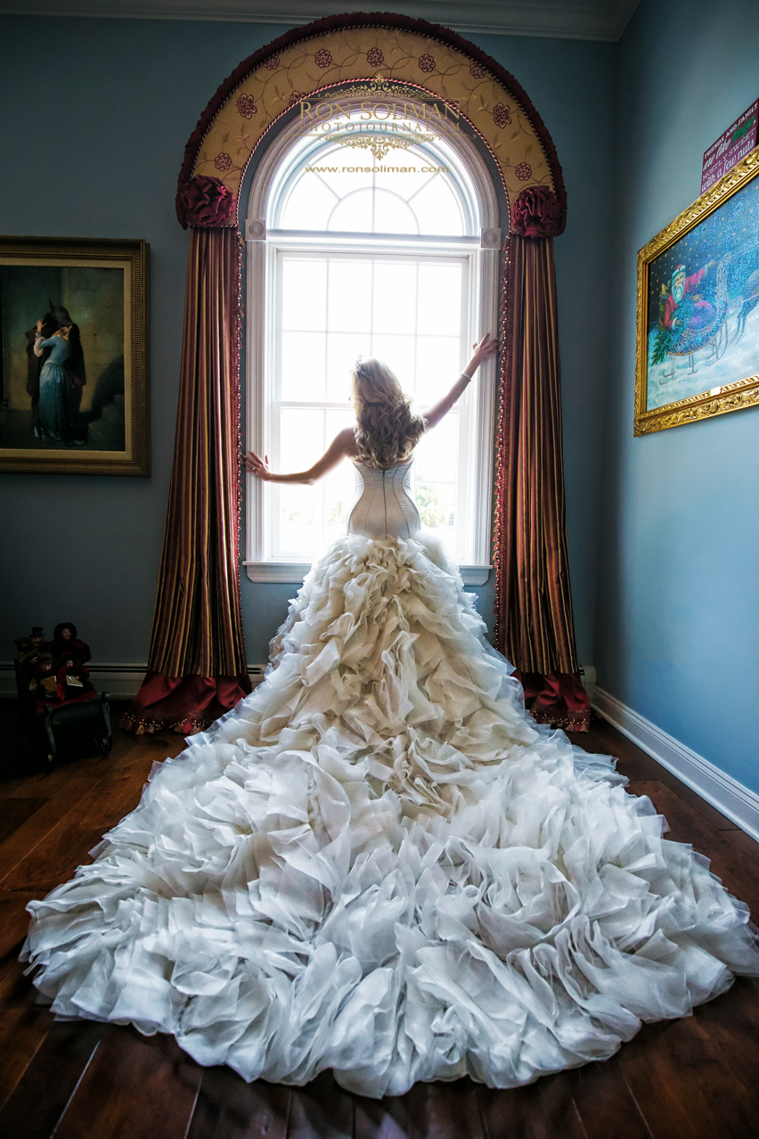 Bride in her Gown Silhouette Window Portrait |  Mark Zunino Couture | Rainbow Room New York Wedding Noel + Rob