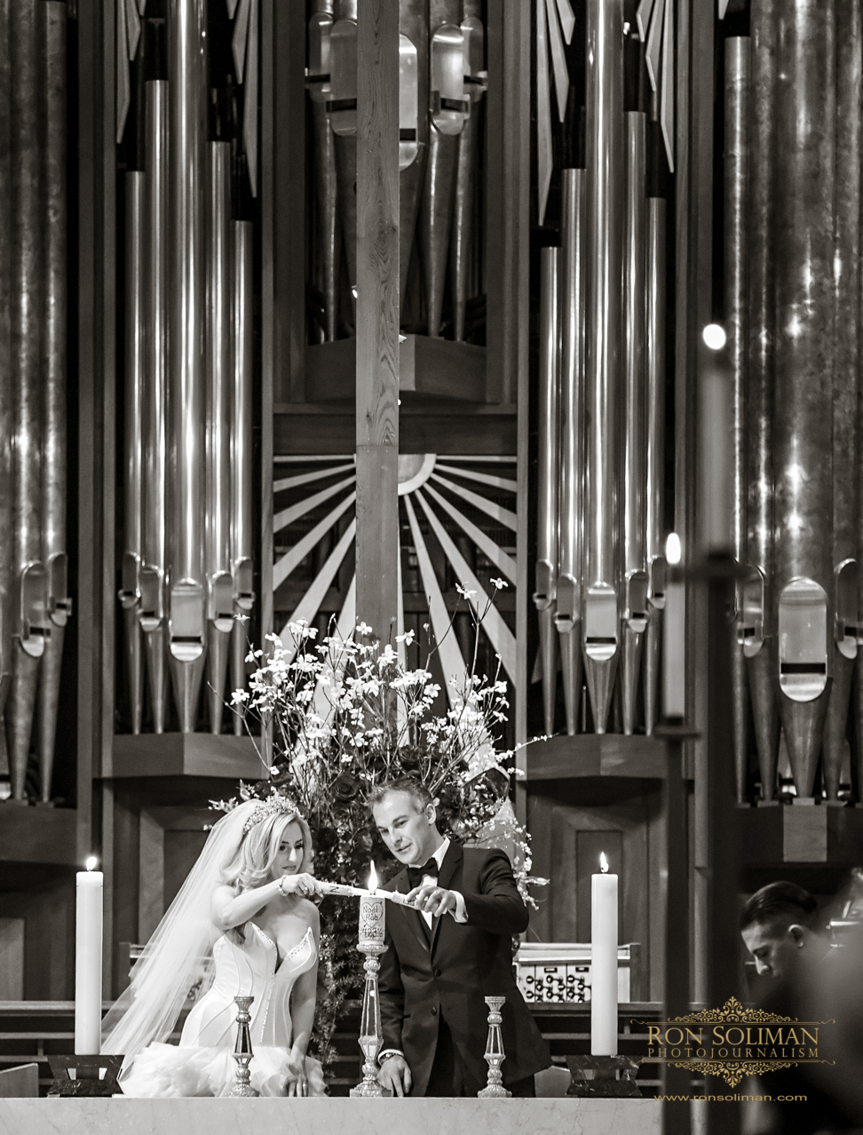 Couple Lighting their Unity Candle | Wedding Traditions |  Rainbow Room New York Wedding Noel + Rob