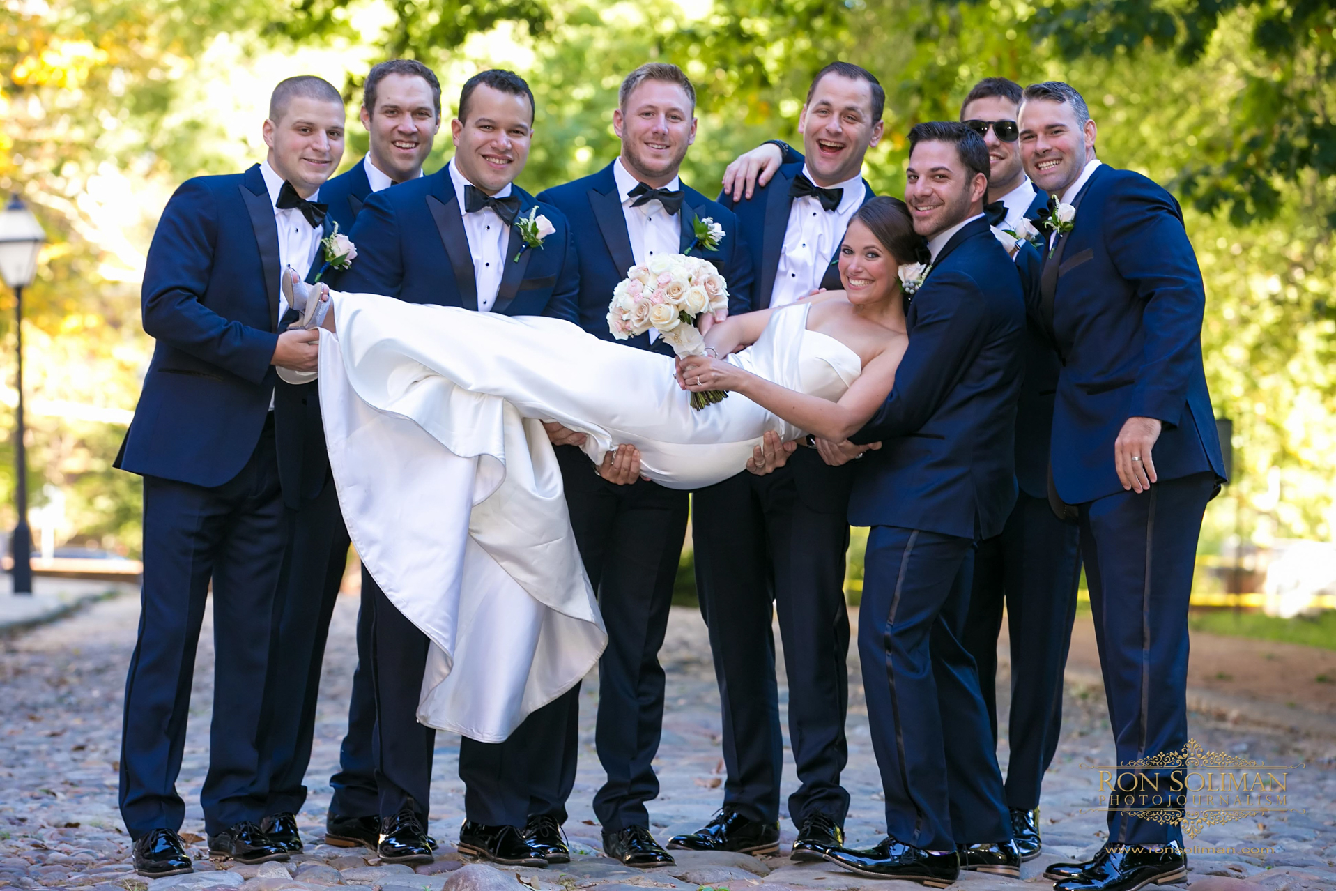 Bride photobombs groomsmen